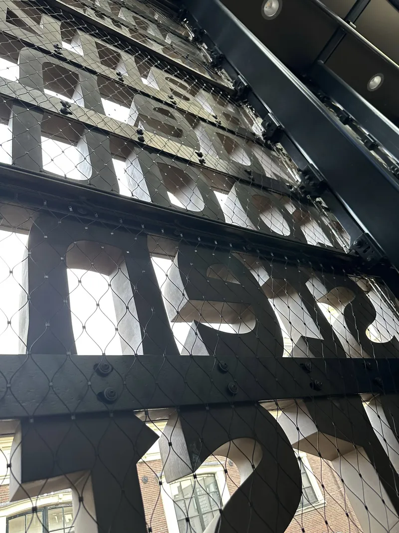 The letters seen from the inside of the library.
